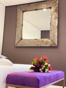 Ein Bett oder Betten in einem Zimmer der Unterkunft Gran Paradiso Hotel Spa