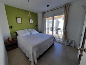 Postel nebo postele na pokoji v ubytování Casa Masaly vistas al mar