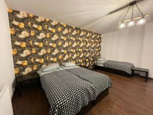 Ένα ή περισσότερα κρεβάτια σε δωμάτιο στο Kassandrov Guest House Ravnogor/ Касандрова къща Равногор