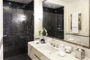 a bathroom with a sink and a shower at Splendido, A Belmond Hotel, Portofino in Portofino