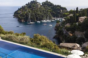 a view of a river with boats in the water at Splendido, A Belmond Hotel, Portofino in Portofino