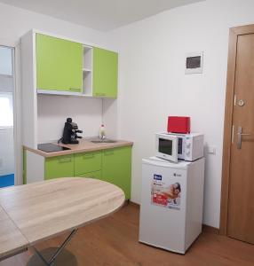 Apartament 10 Budiu tesisinde mutfak veya mini mutfak