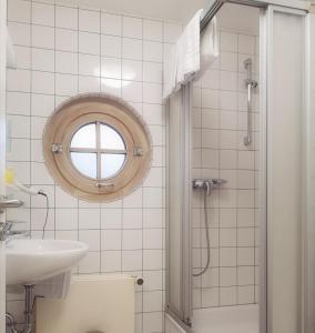 Ванна кімната в Sportschule Oberhaching