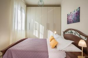 Katil atau katil-katil dalam bilik di The Lagoon Luxury House