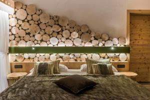 Chalet Pineta relax location客房内的一张或多张床位