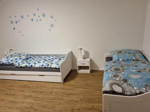 Katil atau katil-katil dalam bilik di Ferienwohnung Stella
