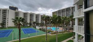 Vaade basseinile majutusasutuses Beachfront Resort with Heated Pool Saida Royale 9039 või selle lähedal