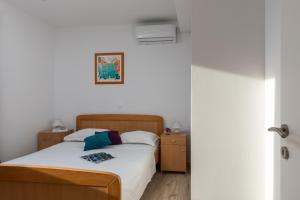 Posteľ alebo postele v izbe v ubytovaní Amarillo Apartments
