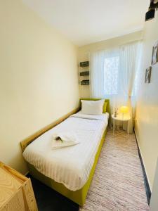 Ένα ή περισσότερα κρεβάτια σε δωμάτιο στο Perfect Place to Stay self check in-24h-NETFLIX-WIFI