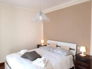 Posteľ alebo postele v izbe v ubytovaní CASETTA MIRAVIGNA cozy flat with garden in Franciacorta & Iseo Lake