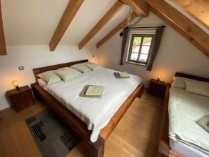 Tempat tidur dalam kamar di Penzion Stodola