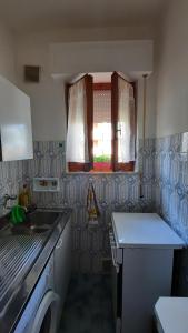 Kuchyň nebo kuchyňský kout v ubytování A casa di Laura