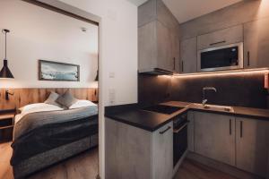 A kitchen or kitchenette at Alpenheim Apartment Ischgl