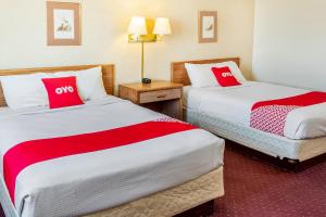 Cama o camas de una habitación en OYO Hotel Shelby MT Hwy 2 & I-15