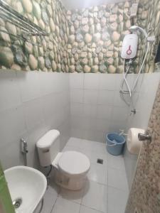 Koupelna v ubytování DJCI Apartelle Walk to Robinson & NE Pacific Mall 3 Min to SM Cabanatuan