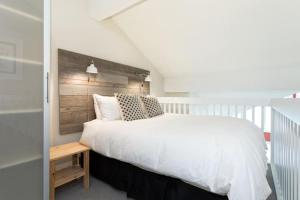 Lofted Suite with Mountain Views and Creekside Location by Harmony Whistler