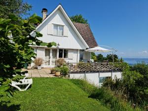 a house with a view of the ocean at Mont Blanc Chalet in Grandevent