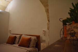 Postel nebo postele na pokoji v ubytování MATTEI LUXURY B&B