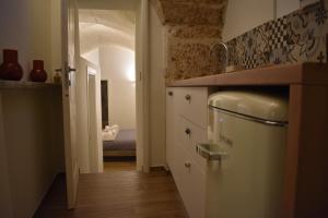 Kuchyň nebo kuchyňský kout v ubytování MATTEI LUXURY B&B