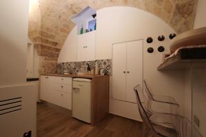 Kuchyň nebo kuchyňský kout v ubytování MATTEI LUXURY B&B