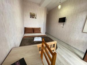 TV a/nebo společenská místnost v ubytování Hotel Tradicia