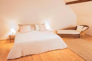 Postel nebo postele na pokoji v ubytování Le Gîte - Graty + 31 fotografií