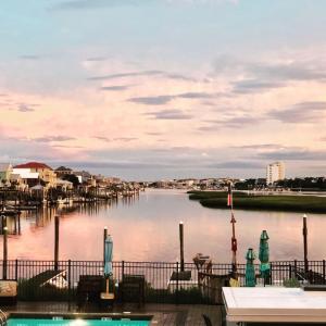 a view of a body of water with a marina at Newly Renovated Beach Condo with STUNNING Water Views! Monthly and Weekly Specials! in Carolina Beach