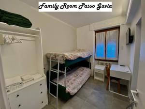 Postel nebo postele na pokoji v ubytování Hotel Sciatori 3 Stelle Superior
