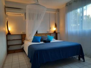 Ένα ή περισσότερα κρεβάτια σε δωμάτιο στο Villa Kannel