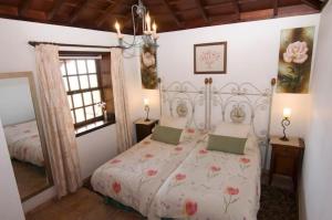Ліжко або ліжка в номері Casa Los Mangos
