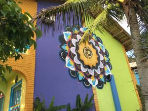 a kite hanging from the side of a building at O Costão do Sol in Balneário Camboriú