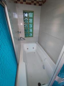 Ванная комната в Nirvana Casa de Huéspedes