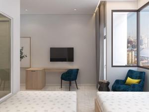 TV a/nebo společenská místnost v ubytování Thiên Thanh Hotel