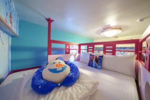 We Smile B&B tesisinde bir odada yatak veya yataklar