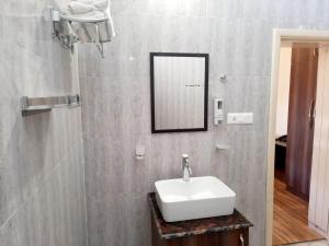 Koupelna v ubytování HOTEL DEV CHHAYA