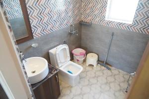 Koupelna v ubytování HOTEL DEV CHHAYA