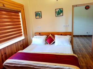 Postel nebo postele na pokoji v ubytování HOTEL DEV CHHAYA