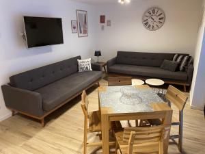 Posedenie v ubytovaní Apartamenty 'Okno z widokiem'