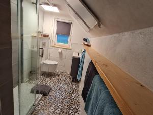 Ein Badezimmer in der Unterkunft Ferienhaus Landpause