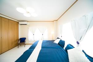 Postel nebo postele na pokoji v ubytování Awaji Seaside Resort in Shiduki1555 + 51 fotografií