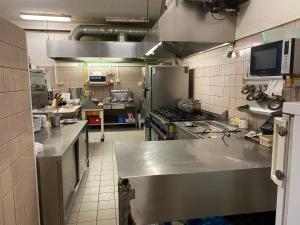 Kuchyň nebo kuchyňský kout v ubytování Restaurant Motel Hana Barbara Gastro sro
