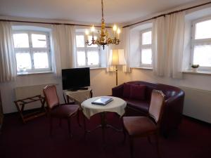 TV a/nebo společenská místnost v ubytování Hotel Haus Appelberg