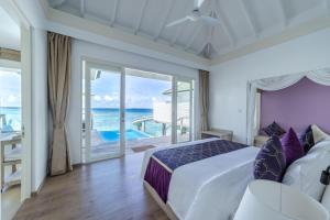 Postel nebo postele na pokoji v ubytování Siyam World Maldives - 24-Hour Premium All-inclusive with Free Transfer