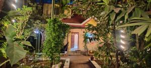 a room filled with lots of plants at Cheerful Villa at Chaul Alibag Near Revdanda and Nagav Beach in Alibaug