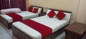 Ein Bett oder Betten in einem Zimmer der Unterkunft Hotel Royal Chautari, Butwal