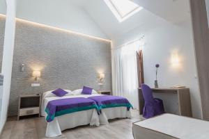Ένα ή περισσότερα κρεβάτια σε δωμάτιο στο Hotel Rural Auñamendi