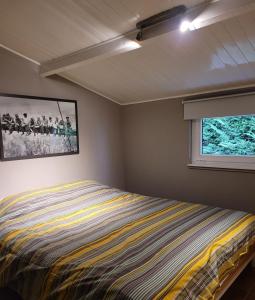 Кровать или кровати в номере Vakantiehuis 6 pers, Oostduinkerke aan zee +26 фотографий