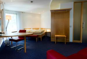 Postel nebo postele na pokoji v ubytování Parkhotel Schillerhöhe