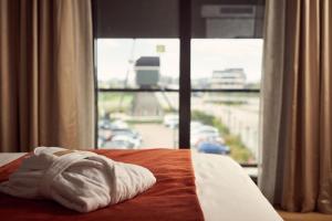 Postel nebo postele na pokoji v ubytování Van der Valk Hotel Breukelen