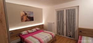 Postel nebo postele na pokoji v ubytování Casa Brugnara